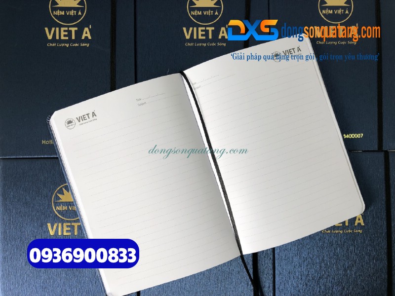 Sổ tay dán gáy màu xanh , kẹp chun , ép kim vàng logo Công Ty Nệm Việt Á 