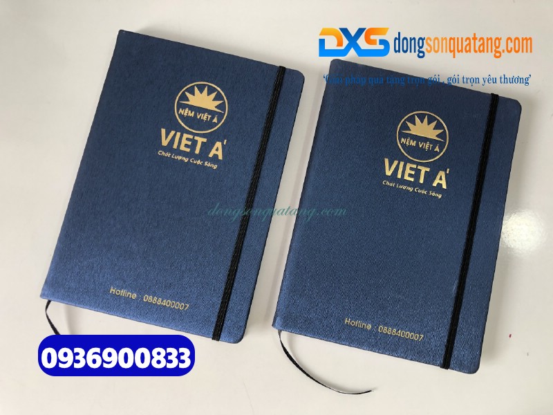 Sổ tay da dán gáy màu xanh , kẹp chun , ép kim vàng logo Công Ty Nệm Việt Á 