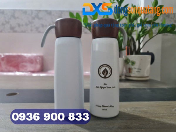 Đông sơn cung cấp bình giữ nhiệt nắp vân gỗ khắc logo vô cùng uy tín