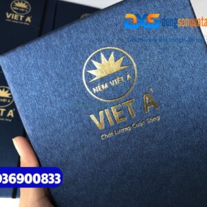 Sổ Tay Dán Gáy A5 Gập 2, Kẹp Dây Thun Màu Xanh - Ép Kim Vàng Logo Cao Cấp Cho Khách Hàng Công Ty Nệm Việt Á